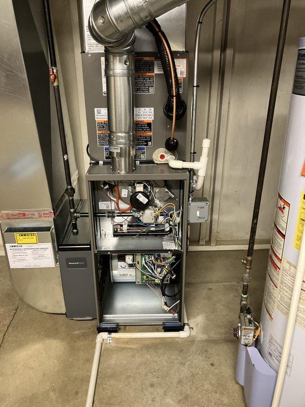 Completed full HVAC system installation including new furnace and air conditioning unit in residential utility room. Successfully installed and connected all ductwork, refrigerant lines, condensate drainage, electrical wiring, and control systems. Verified proper operation of all equipment, submitted permit application, and processed utility rebate documentation.