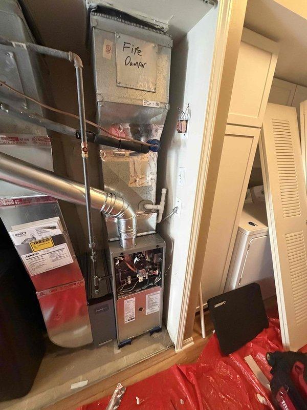 Completed installation of 70,000 BTU furnace in residential utility closet with mechanical permit. Reconnected existing ductwork including fire damper assembly and remeasured return air for proper system sizing. Applied for Consumers Energy and DTE rebates on behalf of homeowner.