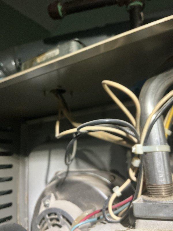 Completed comprehensive tune-up and safety inspection on two 18-year-old furnace units located in attic and crawl space. Performed full system diagnostics including visual inspection of heat exchanger, burner assembly, and blower motor components. Checked electrical connections, tested safety controls, and verified proper operation of all system components. Inspected condensate drain lines and refrigerant connections for leaks or deterioration. Evaluated blower motor performance and examined wiring harnesses for signs of wear or damage. Both units operational and passed safety inspection upon completion of service.