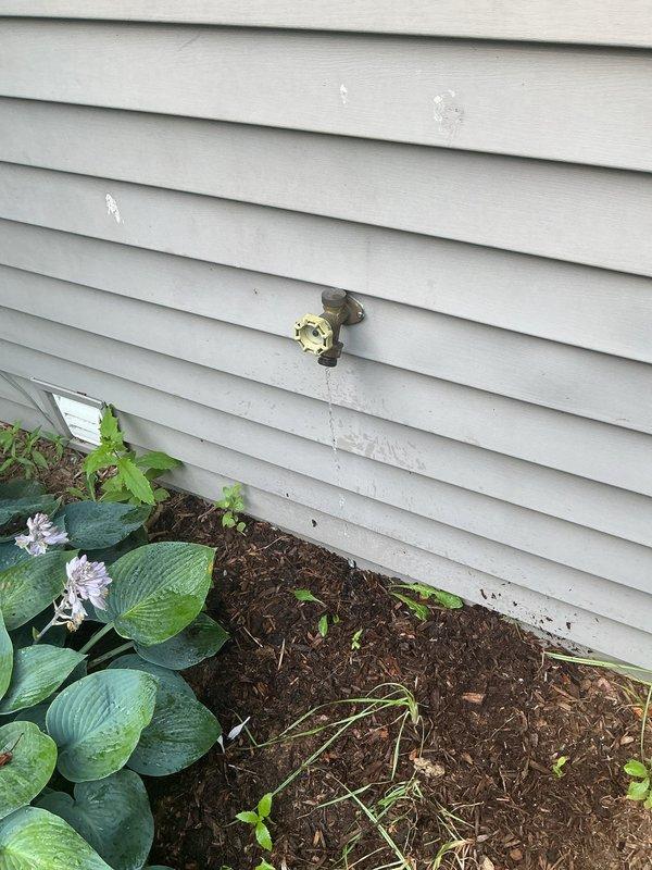 Responded to service call for washer and dryer installation plumbing assessment. Upon arrival, conducted thorough inspection of the property to locate existing water supply lines and drainage connections required for laundry appliance installation. Inspected exterior hose bib on building perimeter and traced copper supply lines through attic space to identify accessible water source points. Located main water supply piping with shutoff valve in attic area above proposed appliance location. Documented existing plumbing infrastructure through photographic evidence showing exterior water connection point and accessible copper piping with valve assembly in ceiling/attic space. Provided homeowner with assessment findings regarding available plumbing connections and routing options for washer supply lines and drain installation.