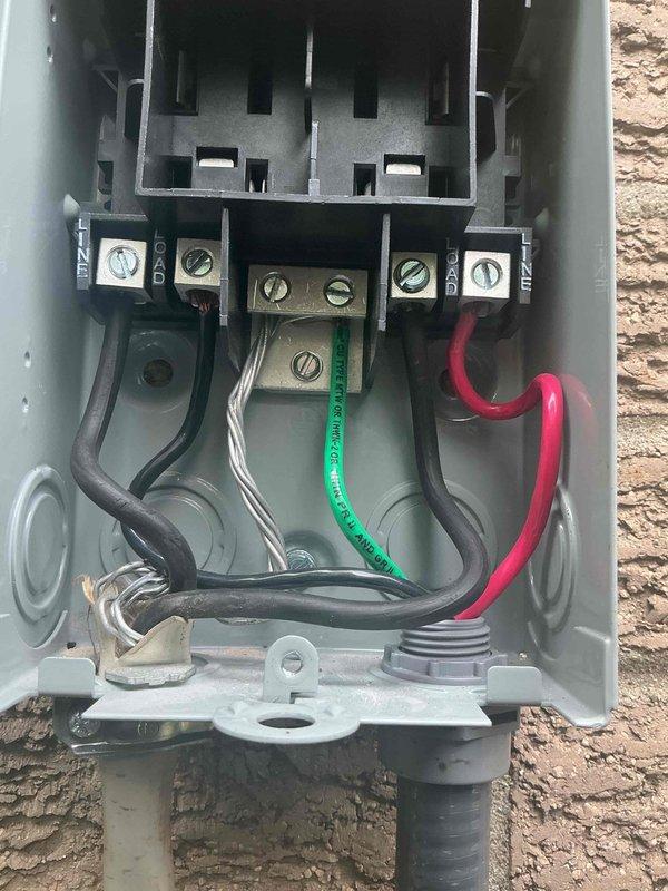 Responded to no cooling complaint on residential 3-ton air conditioning system. Completed installation of new outdoor condensing unit and uncased evaporator coil as part of system replacement. Reconnected electrical wiring at disconnect box, verified proper wire terminations, and ensured all connections were secure. Performed system startup, confirmed proper operation of condenser fan motor, and documented equipment installation with photographs for service records.