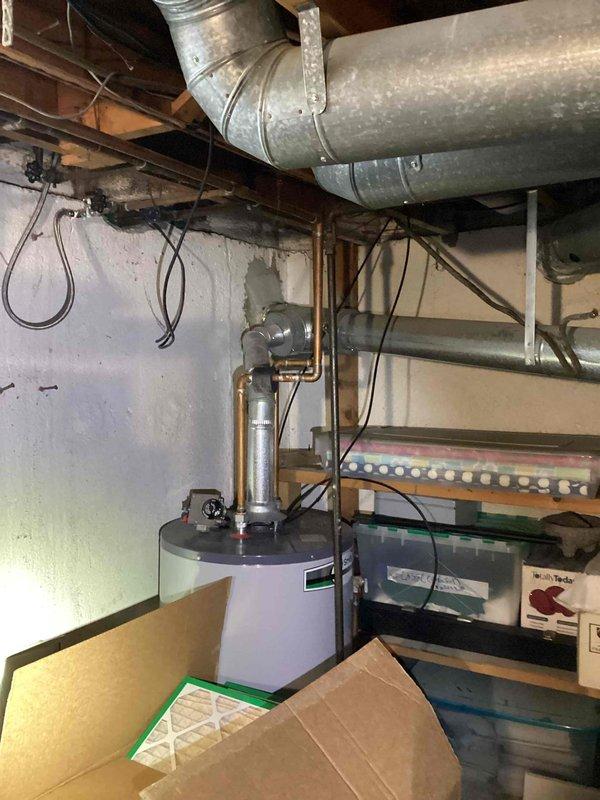 Performed comprehensive assessment of existing air conditioning system in residential property. Current unit determined to be over 20 years old with repair costs exceeding replacement value, making system replacement the most economical solution. Documented existing HVAC infrastructure including ductwork configuration and utility room layout. Photographed basement mechanical systems and exterior equipment location to develop accurate replacement specifications and installation plan. Provided detailed estimate for complete AC system replacement.