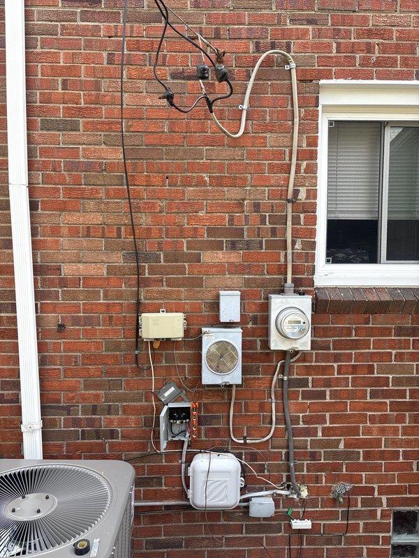 Completed full HVAC system installation including 70,000 BTU furnace and 2.5 ton air conditioning unit in rear yard location. Installation included Sensi thermostat, humidifier, condensate pump, electrical disconnect, and reconnection of existing ductwork. All mechanical, electrical, and furnace permits were secured, system was tested and commissioned, and utility rebate documentation was prepared for submission.