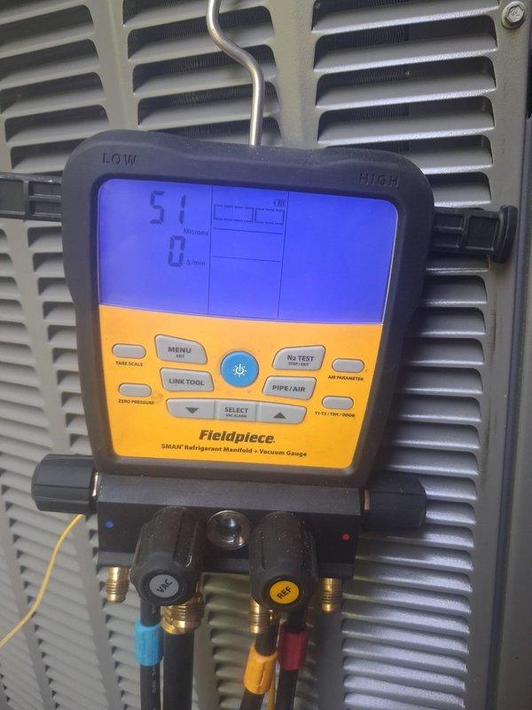 Completed full HVAC system installation including 90,000 BTU furnace and 4-ton air conditioning unit. Installed chimney liner for proper venting, whole-home humidifier, and thermostat. Performed system flush, installed condensate pump, and evacuated refrigerant lines to proper vacuum levels as verified by micron gauge readings. Added electrical breakers to service panel for new equipment, reconnected all utilities, and tested system operation to manufacturer specifications.