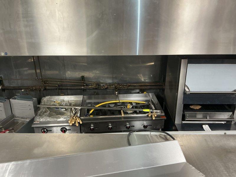 Conducted on-site assessment of commercial kitchen to provide estimate for gas line connection to multiple cooking appliances. Evaluated existing gas infrastructure, including routing requirements for professional-grade range, deep fryer, and additional kitchen equipment positioned under exhaust hood system. Inspected current gas line configuration, pipe sizing requirements, and connection points needed to safely supply gas to all equipment per commercial code specifications.