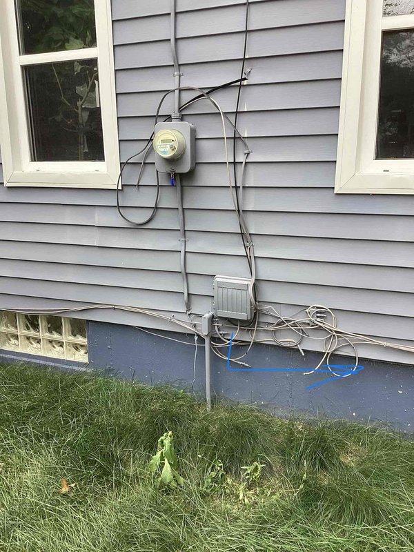 Conducted comprehensive assessment of 10+ year old residential HVAC system for replacement estimate, including air conditioning unit and natural gas furnace located in basement. Evaluated existing equipment condition, ductwork configuration, electrical service panel and meter setup on exterior wall, and overall system layout to determine replacement requirements. Documented current operational status of functioning AC unit and photographed existing installation for equipment sizing and system design specifications.