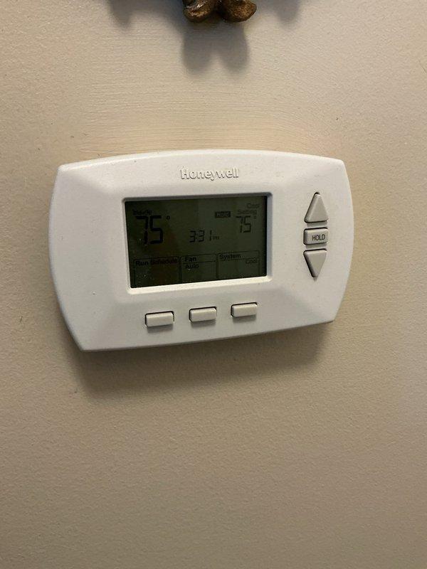 Responded to condensation leak from PVC drain line on 10-year-old AC system located in basement. Inspected condensate drainage system and cleared blockage in primary drain line. Verified proper drainage flow and confirmed dehumidifier unit was operating correctly to manage basement humidity levels at 33%.
