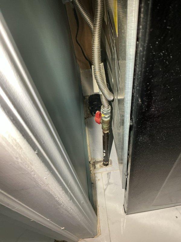 Replaced kitchen faucet with customer-supplied fixture, including disconnection of existing unit and installation of new faucet assembly with proper supply line connections and drain hookup. Installed garbage disposal unit under sink, requiring new electrical circuit installation with dedicated wall switch and junction box for operation. Relocated gas line to allow range to be positioned closer to wall, including disconnection of existing line, rerouting of gas piping, pressure testing of connections, and verification of proper operation upon completion.