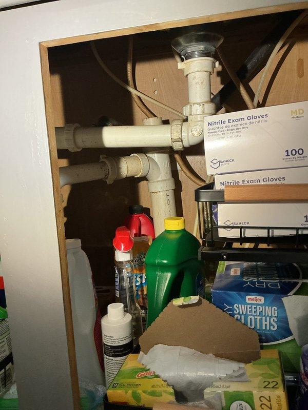 Replaced kitchen faucet with customer-supplied fixture, including disconnection of existing unit and installation of new faucet assembly with proper supply line connections and drain hookup. Installed garbage disposal unit under sink, requiring new electrical circuit installation with dedicated wall switch and junction box for operation. Relocated gas line to allow range to be positioned closer to wall, including disconnection of existing line, rerouting of gas piping, pressure testing of connections, and verification of proper operation upon completion.