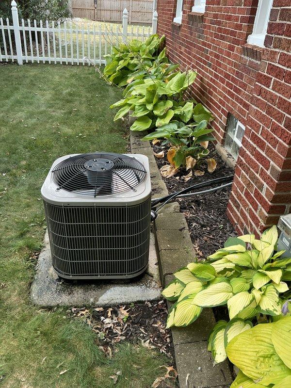 Responded to service call for water leak near basement furnace with water accumulation around the unit. Conducted comprehensive system assessment of forced air HVAC system estimated to be 10+ years old. Inspected outdoor condensing unit, verified electrical connections at main panel including dedicated circuits for air conditioner and furnace, and documented equipment conditions to provide full system replacement estimate due to age and existing leak issue.