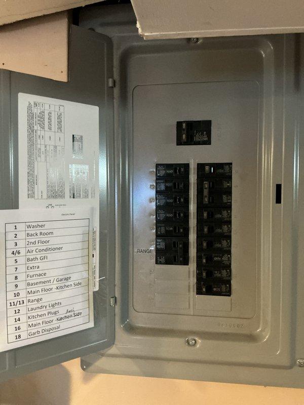 Responded to service call for water leak near basement furnace with water accumulation around the unit. Conducted comprehensive system assessment of forced air HVAC system estimated to be 10+ years old. Inspected outdoor condensing unit, verified electrical connections at main panel including dedicated circuits for air conditioner and furnace, and documented equipment conditions to provide full system replacement estimate due to age and existing leak issue.