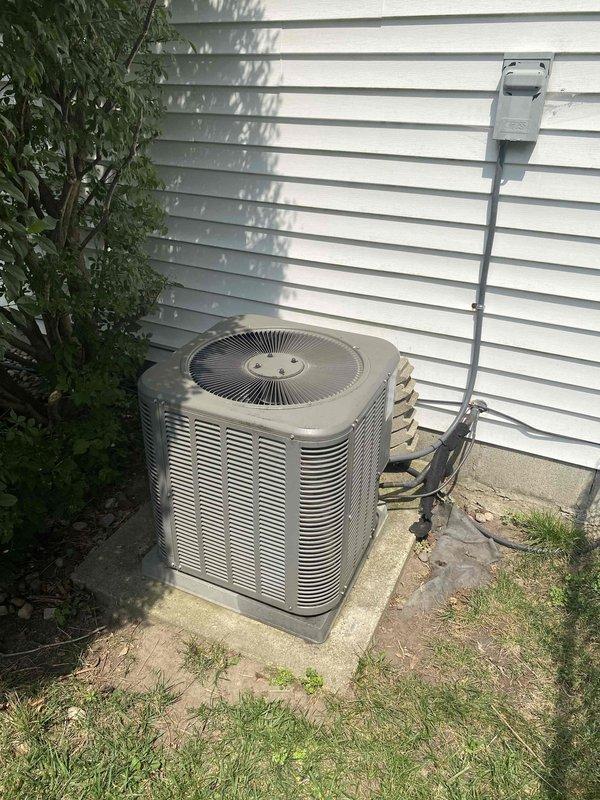 Conducted comprehensive site assessment for full HVAC system replacement, evaluating existing air conditioning condenser unit and furnace installation. Documented current equipment configuration including outdoor condensing unit with radial fan assembly, refrigerant line routing, electrical connections, and interior mechanical space showing PVC venting and ductwork infrastructure. Provided detailed estimate for new air conditioner and furnace system replacement, discussed available equipment options and promotional offers, and photographed existing installations to support equipment sizing and installation planning recommendations.