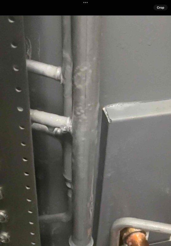 Performed return visit to conduct leak search on 2-month-old AC system experiencing cooling failure with fan-only operation. Replaced defective zone motors at basement and backyard equipment locations. Inspected refrigerant lines, electrical connections, and ductwork components; awaiting parts for duct whistle noise resolution.
