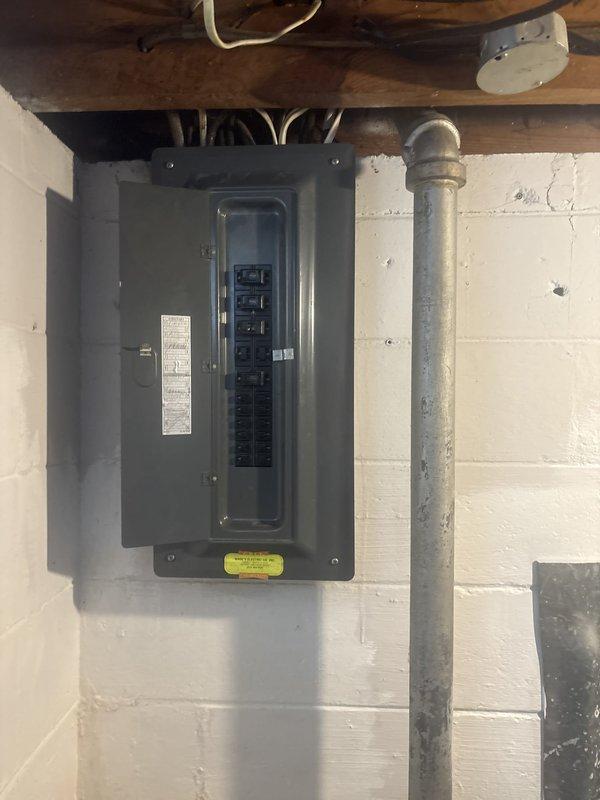 Replaced two 15-amp tandem Pushmatic circuit breakers in the main electrical panel. Removed the old breakers, installed new tandem breakers, verified proper connections, and tested for correct operation to restore safe electrical service to the affected circuits.