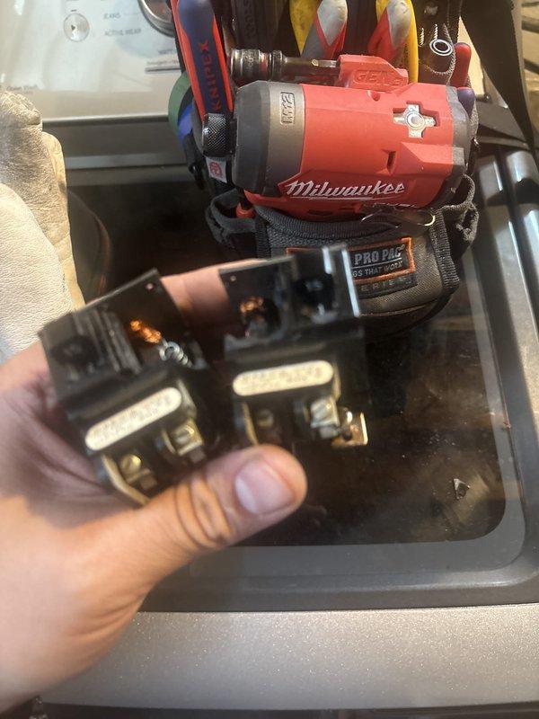 Replaced two 15-amp tandem Pushmatic circuit breakers in the main electrical panel. Removed the old breakers, installed new tandem breakers, verified proper connections, and tested for correct operation to restore safe electrical service to the affected circuits.