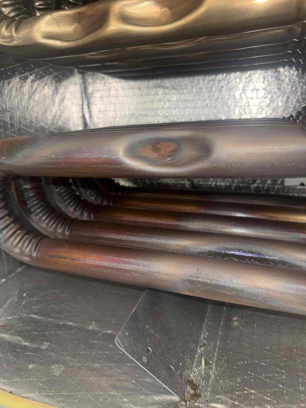 Responded to service call for air conditioning system not keeping up with cooling demand in 5-year-old condo unit. Upon arrival, coordinated access through building reception and conducted diagnostic evaluation of the system. Performed visual inspection of evaporator coil assembly, noting oxidation and discoloration on copper tubing consistent with age and normal operation. Verified electrical supply to system using digital multimeter, confirming proper voltage at 120.2V to control circuit. Inspected internal components including heat exchanger coils, insulation, and drain pan for signs of damage, leaks, or obstruction. Documented system condition through photography for service records.