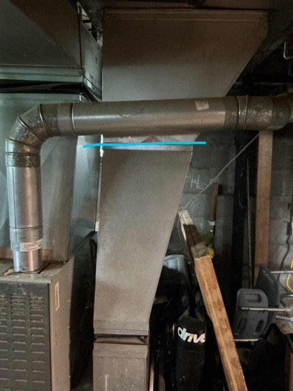 Completed furnace inspection on Trane heating unit located in basement utility area. Assessed overall system condition, ductwork connections, and operational components to provide replacement estimate. Documented existing equipment configuration including air handler, ventilation system, and associated mechanical components for homeowner's consideration of system replacement options.