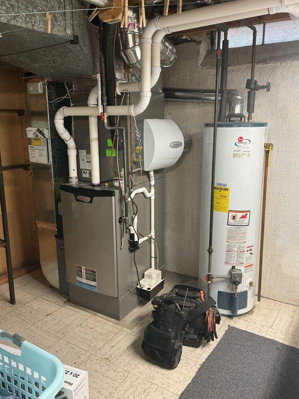 Completed Gold level furnace inspection on a 3-year-old gas furnace located in basement. Performed comprehensive system evaluation including visual inspection of heat exchanger, burner assembly, gas valve connections, and electrical components. Verified proper operation of all safety controls and limit switches. Inspected and tested ignition system, flame sensor, and inducer motor. Checked all gas connections for leaks and confirmed proper venting through PVC exhaust system. Evaluated blower motor operation and inspected air filter condition. Tested thermostat communication and system cycling. Examined humidifier installation and connections. Verified proper condensate drainage. All components found operating within manufacturer specifications with no immediate safety concerns identified. Unit functioning properly at time of inspection.
