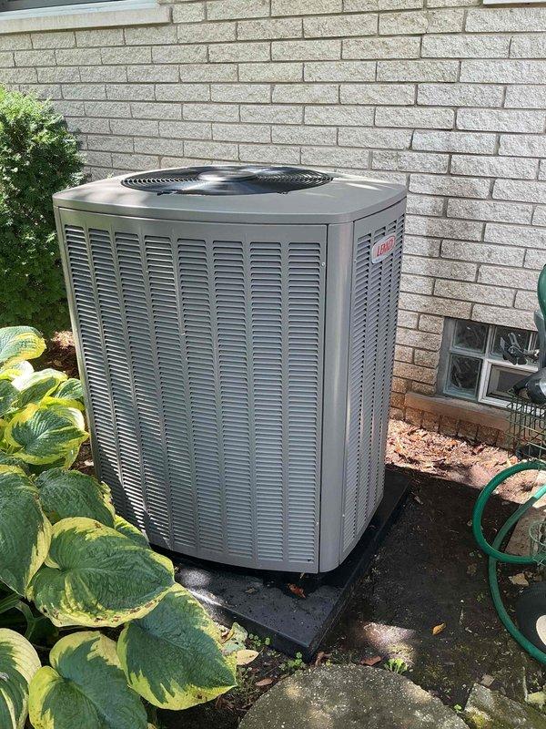 Responded to water leak complaint caused by basement air conditioning system freezing up and producing excessive condensation. Upon inspection, found evaporator coil experiencing ice buildup due to restricted airflow. Verified condensate drain line and pump operation; pump was functional but drain line showed signs of partial blockage. Cleared condensate line obstruction and confirmed proper drainage. Inspected outdoor condenser unit and found it operating within normal parameters. Checked refrigerant levels and system pressures—all readings normal. Identified dirty air filter as primary cause of reduced airflow leading to coil freeze-up. Replaced air filter and allowed system to thaw completely. Cycled system through multiple cooling cycles to verify proper operation and confirm no further water accumulation on floor. Educated homeowner on importance of regular filter changes to prevent future freeze-up conditions. System restored to normal cooling operation with proper condensate dra