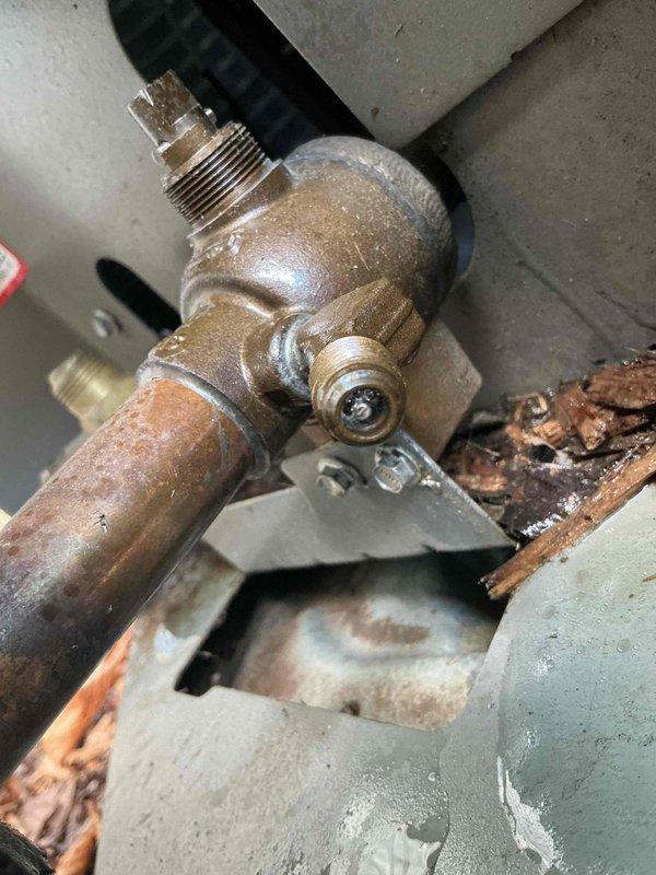Responded to water leak complaint caused by basement air conditioning system freezing up and producing excessive condensation. Upon inspection, found evaporator coil experiencing ice buildup due to restricted airflow. Verified condensate drain line and pump operation; pump was functional but drain line showed signs of partial blockage. Cleared condensate line obstruction and confirmed proper drainage. Inspected outdoor condenser unit and found it operating within normal parameters. Checked refrigerant levels and system pressures—all readings normal. Identified dirty air filter as primary cause of reduced airflow leading to coil freeze-up. Replaced air filter and allowed system to thaw completely. Cycled system through multiple cooling cycles to verify proper operation and confirm no further water accumulation on floor. Educated homeowner on importance of regular filter changes to prevent future freeze-up conditions. System restored to normal cooling operation with proper condensate dra