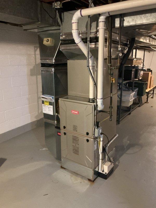 Replaced failed control board, surge protector, and transformer on Bryant residential furnace system located in basement mechanical room. All replacement components were sourced from parts department and installed to restore proper system operation and protect equipment from electrical damage.