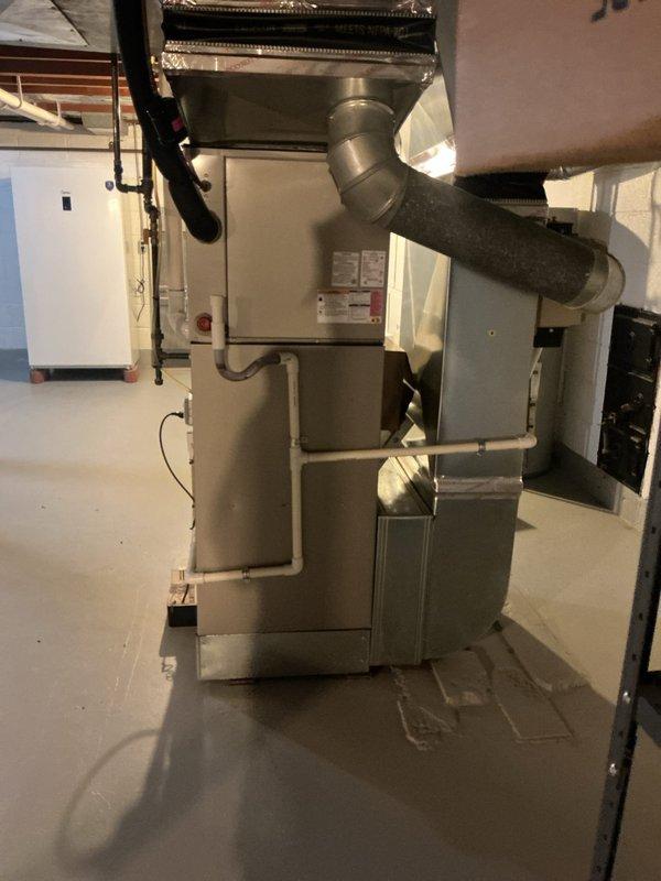 Replaced failed control board, surge protector, and transformer on Bryant residential furnace system located in basement mechanical room. All replacement components were sourced from parts department and installed to restore proper system operation and protect equipment from electrical damage.