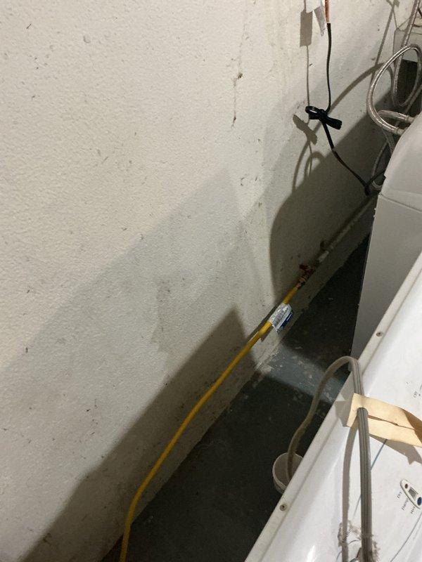Responded to service call for gas line replacement to facilitate new dryer installation. Removed existing 6-foot copper gas line and replaced with code-compliant yellow flexible gas connector (CSST). Secured all connections, performed leak test using approved detection solution, and verified proper gas flow to appliance. Installation completed successfully, allowing customer to proceed with dryer hookup.