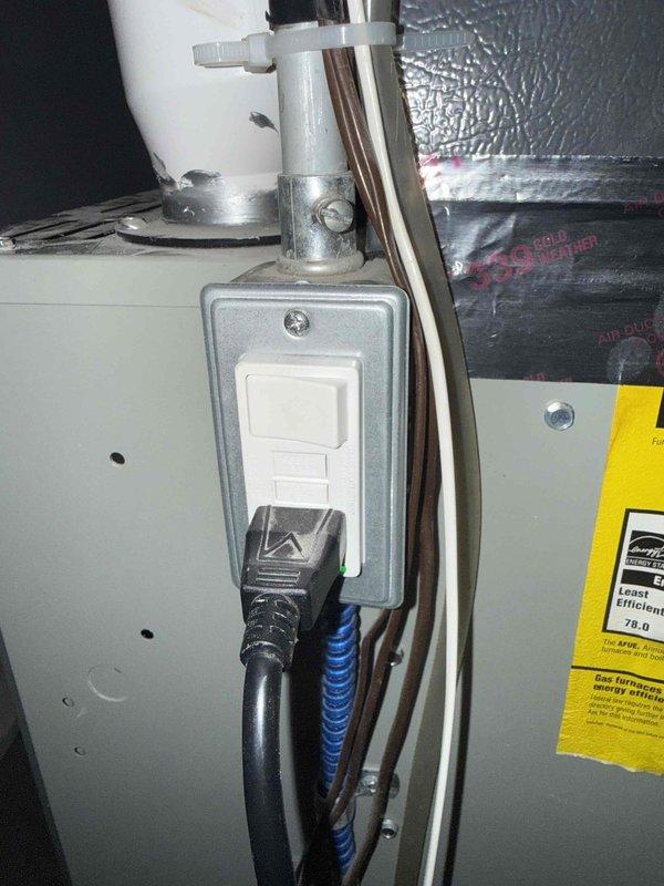Responded to no heat call for 7-year-old AC system located in basement. Upon inspection, found power source failure affecting both the air conditioning unit and condensate pump. Diagnosed electrical supply issue at outlet feeding the equipment. Verified proper wiring connections at furnace control board and traced power loss to failed GFCI receptacle supplying the condensate pump. Replaced defective outlet, restored power to condensate pump and confirmed proper drainage function. Tested all electrical connections, verified system controls operational, and confirmed heating system restored to normal operation.