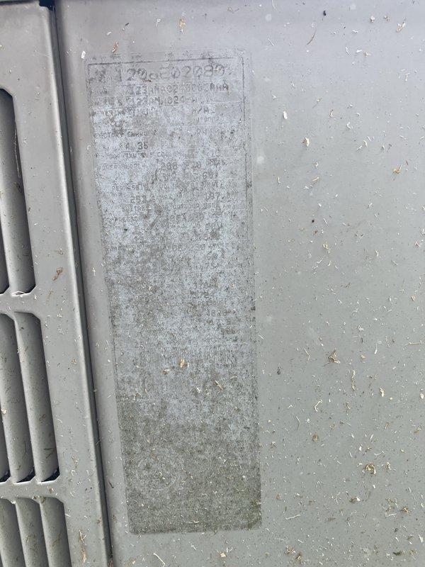 Performed comprehensive inspection of 20-year-old residential HVAC system located in basement. Identified cracked heat exchanger in gas furnace, presenting safety concern requiring immediate attention. Evaluated air conditioning system showing low refrigerant levels and diminished cooling capacity. Assessed overall system condition, noting significant age-related deterioration on equipment labels and components. Documented gas valve assembly, ductwork connections, and condensate drain lines. Provided full system replacement estimate due to critical heat exchanger failure and age of equipment beyond serviceable life expectancy.