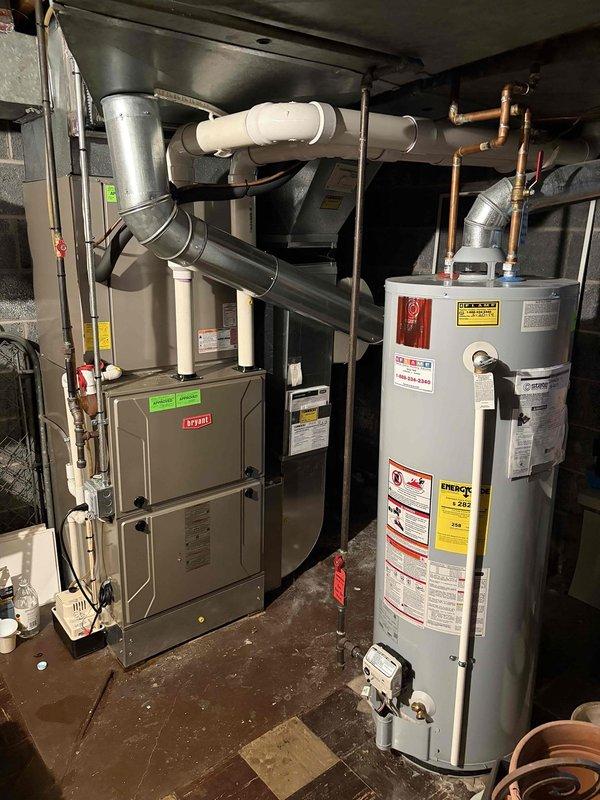 Responded to no cooling complaint on 10+ year old AC unit located in basement. Upon arrival, found condensate pump not operating, preventing AC system from running due to safety float switch activation. Inspected GFCI-protected outlet supplying power to pump and discovered circuit had tripped. Reset GFCI receptacle, restored power to condensate pump, and verified proper pump operation and drainage. Tested AC system operation and confirmed unit cooling normally with proper airflow from indoor blower. Advised homeowner to monitor GFCI outlet for future trips, which may indicate pump motor drawing excessive current or potential ground fault condition requiring pump replacement.