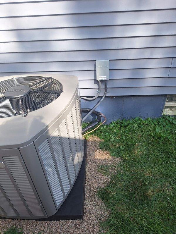 Completed installation of a 2.5-ton air conditioning system with matching evaporator coil in the left side yard. The condenser unit was relocated to a new concrete pad with electrical disconnect box and proper line set connections. Inside, the evaporator coil was installed above the air handler with new refrigerant lines and condensate pump. All electrical and mechanical connections were completed, and the system was commissioned and tested for proper operation. Permits were obtained for mechanical, electrical, and air conditioning work as required.