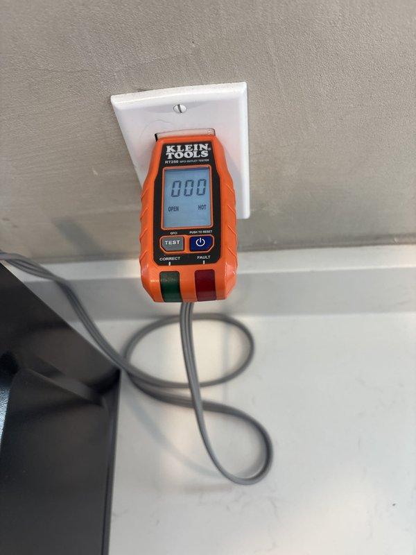 Responded to non-functioning kitchen outlets in vacant apartment unit. Upon arrival, accessed electrical panel in basement and performed circuit testing using digital outlet tester to diagnose the issue. Identified tripped GFCI circuit protecting kitchen outlet branch, reset breaker, and verified proper voltage and wiring configuration at all affected receptacles to restore full functionality.