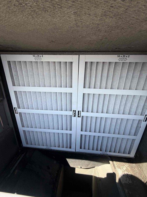 Responded to no-start condition on commercial air conditioning unit. Upon arrival, discovered system was non-operational. Inspected air handling system and found multiple clogged air filters restricting airflow, which likely contributed to system shutdown. Removed and replaced three dirty 16x25x2 pleated air filters from ceiling-mounted filter housing. Verified proper filter orientation with directional arrows for correct airflow. System restored to normal operation following filter replacement. Unit tested and confirmed running properly at completion of service.