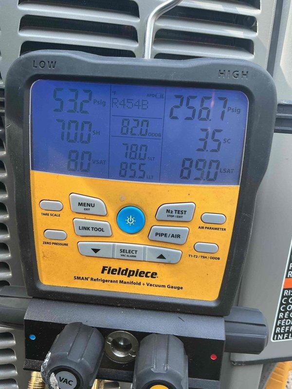 Completed full air conditioning system and evaporator coil installation with associated mechanical, electrical, and refrigerant line connections. System was properly charged and tested using manifold gauges, achieving operational pressures of 59.2 PSIG low side and 258.7 PSIG high side with 35°F subcooling. All required permits were obtained for mechanical, electrical, AC tonnage, yard work, and reconnection prior to installation. Follow-up service scheduled to evaluate potential TXV issue.