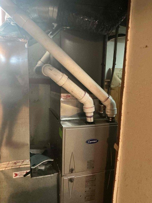 Completed full air conditioning system and evaporator coil installation with associated mechanical, electrical, and refrigerant line connections. System was properly charged and tested using manifold gauges, achieving operational pressures of 59.2 PSIG low side and 258.7 PSIG high side with 35°F subcooling. All required permits were obtained for mechanical, electrical, AC tonnage, yard work, and reconnection prior to installation. Follow-up service scheduled to evaluate potential TXV issue.