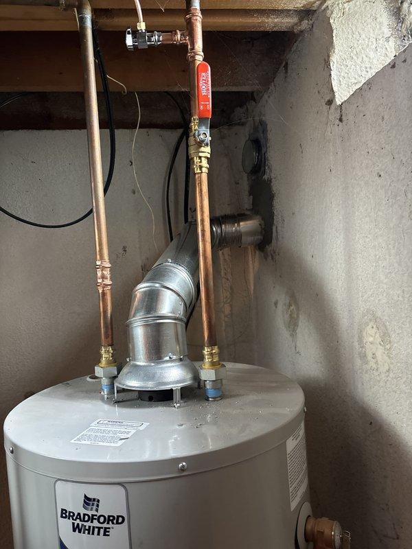 Completed full HVAC system installation including a 90,000 BTU furnace with humidifier and liner, 3-ton air conditioning unit with rear discharge configuration, and new programmable thermostat. Coordinated mechanical permit for furnace and AC components, with electrical reconnection handled by licensed electrician as required. System tested and verified operational with proper airflow and temperature differentials; customer qualified for utility rebates through Consumers Energy and DTE Energy programs.