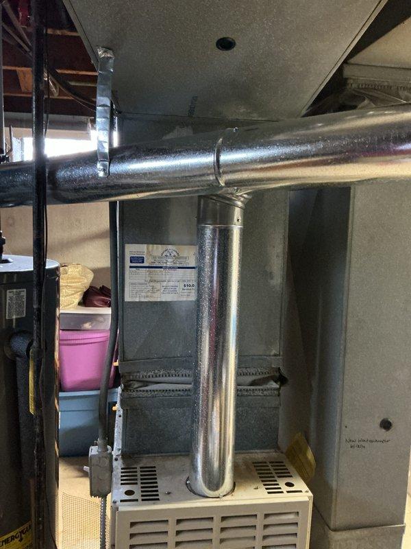 Provided comprehensive estimate for complete HVAC system replacement in basement location. Evaluated existing Bryant gas furnace and non-operational air conditioning system, both with unknown age but last serviced in 2008-2009. Assessed current equipment condition, ductwork configuration, venting system, and utility connections. Documented existing installation with detailed photographs showing furnace cabinet, exhaust venting, and horizontal duct distribution system. Reviewed customer requirements for new natural gas furnace and air conditioning replacement to restore full heating and cooling capabilities to the residence.