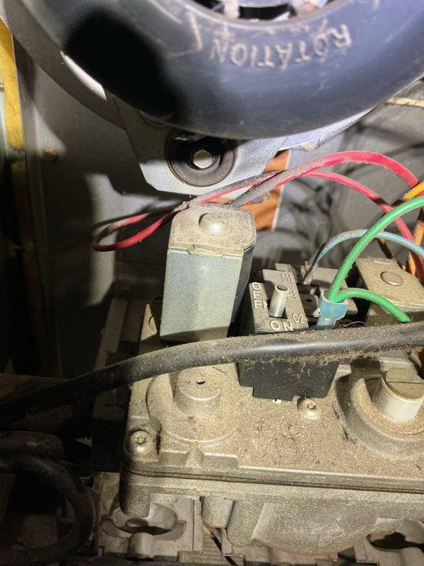 Responded to no-cool complaint on 10-year-old basement AC unit experiencing poor performance during humid conditions. Upon inspection, discovered compromised refrigerant lines with visible wear, deteriorated insulation, and potential leak points on copper piping. Examined compressor electrical connections, noting accumulated dust and aging wire terminals on motor assembly. System showed signs of reduced efficiency consistent with age and lack of maintenance. Documented equipment condition with photos of refrigerant valve assembly and compressor wiring harness for customer review and recommended comprehensive system evaluation to determine whether repair or replacement would be most cost-effective given unit age and current performance issues.