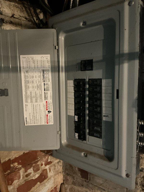 Completed full HVAC system estimate for residential property requiring new heating and cooling installation to replace damaged boiler system in basement. Assessed existing electrical service panel and exterior building conditions to determine requirements for furnace and air conditioning unit installation. Provided comprehensive estimate for brand new forced air heating and cooling system with all necessary ductwork, electrical connections, and equipment placement specifications.