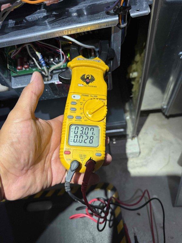 Completed comprehensive tune-up and safety inspection on 25-year-old furnace system located in basement. Performed electrical diagnostics using digital multimeter to verify proper voltage and amperage readings across control board and system components. Inspection included evaluation of humidifier operation, thermostat functionality, hot water tank condition, blower assembly, wiring connections, and all safety controls to ensure system is operating within manufacturer specifications.