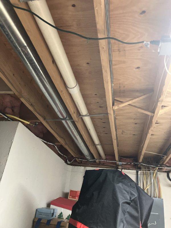 Conducted estimate for complete HVAC system replacement including 19-year-old air conditioning unit with failed compressor and 19-year-old furnace in basement utility room. Evaluated existing equipment configuration, ductwork routing through basement ceiling joists, thermostat location, and exterior AC placement at back corner of property. Provided comprehensive replacement options for combined AC and furnace installation to maximize cost efficiency per customer request.