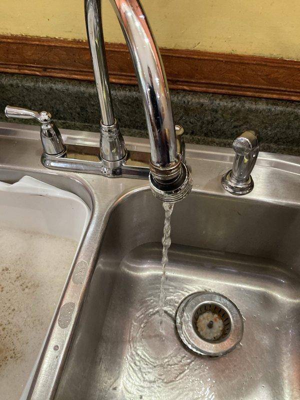 Responded to service call for shower head replacement in residential bathroom. Upon arrival, assessed existing chrome tub and shower fixtures mounted above bathtub. Removed old shower head assembly and installed new chrome shower head unit, ensuring proper connection to existing plumbing infrastructure. Tested water flow and pressure through new fixture to verify proper operation and checked for leaks at all connection points. All fixtures functioning correctly upon completion.