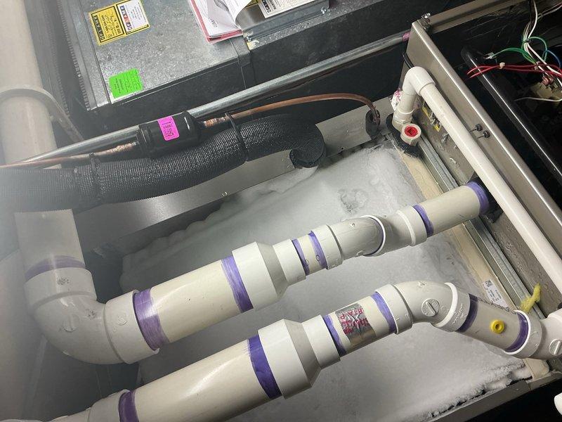 Completed comprehensive Gold Plan AC inspection on a 5-year-old air conditioning system with air handler located in basement. Performed thorough visual inspection of HVAC equipment, including air handler unit, refrigerant lines with proper identification tags, and associated condensate drainage system. Verified all PVC condensate piping, fittings, and drain connections for proper operation and absence of leaks. Inspected electrical components, wiring, and junction boxes for secure connections and code compliance. Examined water filtration system integrated with mechanical equipment to ensure proper function. Confirmed all mechanical components, ductwork, and refrigerant lines were properly installed and maintained. Unit operating within normal parameters with no immediate service needs identified.