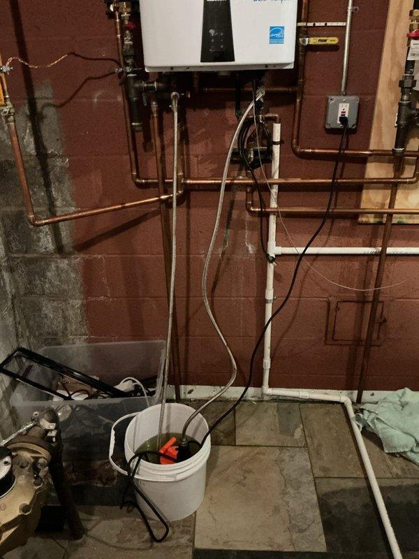 Completed preventive maintenance service on two tankless water heater units. Performed thorough descaling flush on both systems by isolating the units, connecting flushing equipment with descaling solution, and circulating through the heat exchangers to remove mineral buildup and scale deposits. Inspected internal components, burner assemblies, and heat exchangers during service. Verified proper operation of all electrical connections, gas supply lines, and plumbing connections. Tested both units for proper ignition, flame characteristics, and temperature output upon completion. All systems restored to normal operation with improved efficiency.