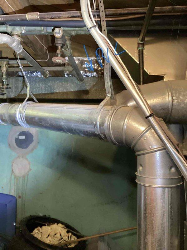 Performed comprehensive evaluation of 20-year-old air conditioning system located in basement following customer report of inadequate cooling performance and suspected refrigerant deficiency. Conducted thorough inspection of existing HVAC infrastructure, including aged galvanized ductwork showing significant weathering and surface deterioration, assessed overall system condition and capacity. Provided full system replacement estimate based on equipment age, current performance issues, and observed wear on distribution components to ensure optimal cooling efficiency and reliability.