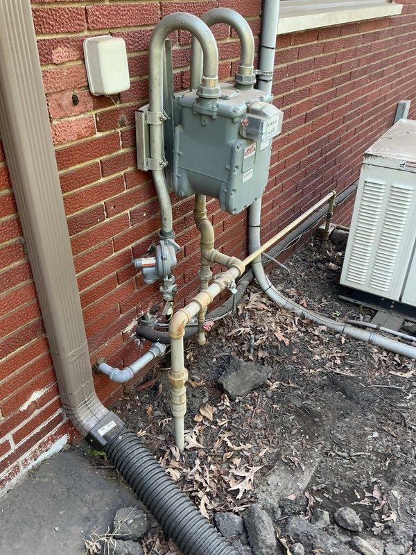 Upsized gas line from existing meter to pool house to increase capacity and meet customer requirements. Excavated trench across backyard from meter location at main residence to pool house structure. Installed new gas piping with proper sizing, connections, and fittings to accommodate increased gas flow demands. Tested system for leaks and proper pressure, ensuring all connections at meter assembly and termination point meet code requirements. Backfilled trench and restored work area.
