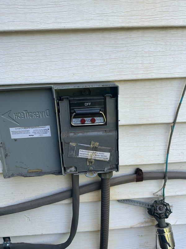Responded to service call for 3-year-old Goodman air conditioning system blowing warm air with ongoing cooling issues. Upon arrival, found electrical disconnect switch in the OFF position at exterior unit. Restored power to condenser unit and verified system operation. System resumed normal cooling function after power was restored to the equipment.