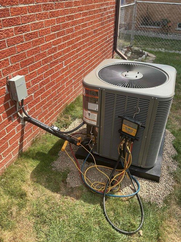 Completed full HVAC system installation including 70,000 BTU furnace, 2.5-ton air conditioning unit with rear discharge configuration, programmable thermostat, humidifier, and condensate pump. Obtained mechanical and electrical permits prior to installation. Performed system flush and refrigerant line connections, reconnected existing electrical service, and commissioned both heating and cooling systems. Verified proper operation of all components and registered equipment for available utility rebate program.