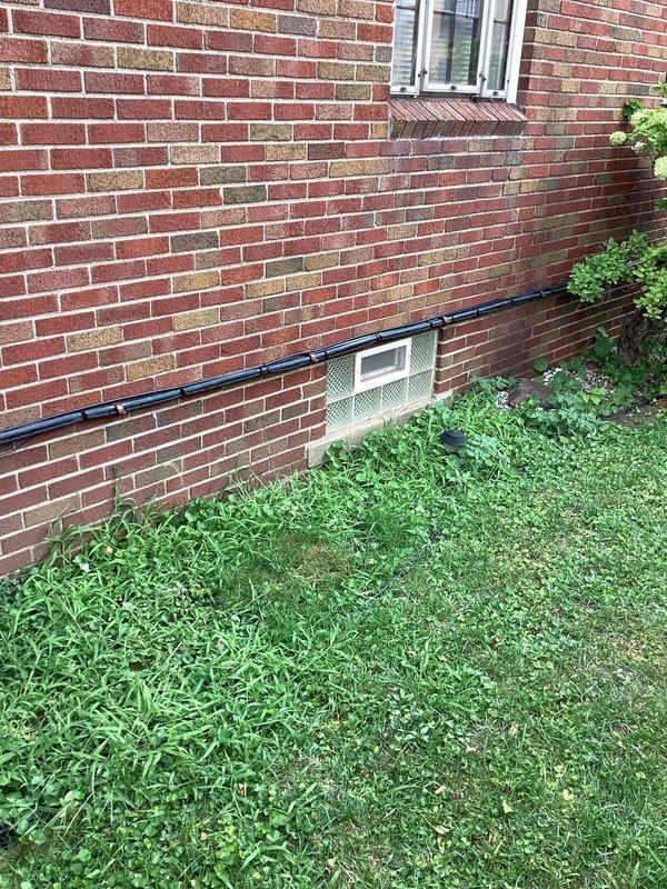 Conducted on-site evaluation for new whole home generator installation at manufactured residence. Assessed existing electrical infrastructure including basement utility area with current 3-wire configuration requiring modification. Documented exterior installation location on brick wall near existing HVAC penetration with adequate clearance from landscaping and foundation. Evaluated electrical service panel accessibility and determined routing requirements for new generator feed lines. Provided comprehensive estimate for complete whole home generator system installation including necessary electrical upgrades to support automatic transfer switch integration.