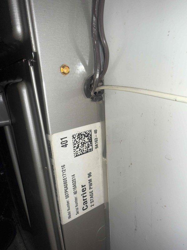 Responded to service call for freezing pipes located behind 14-year-old furnace unit in basement. Upon inspection, assessed HVAC system configuration and environmental conditions contributing to pipe freeze issue. Documented equipment installation and exterior condenser unit positioning for comprehensive service records.